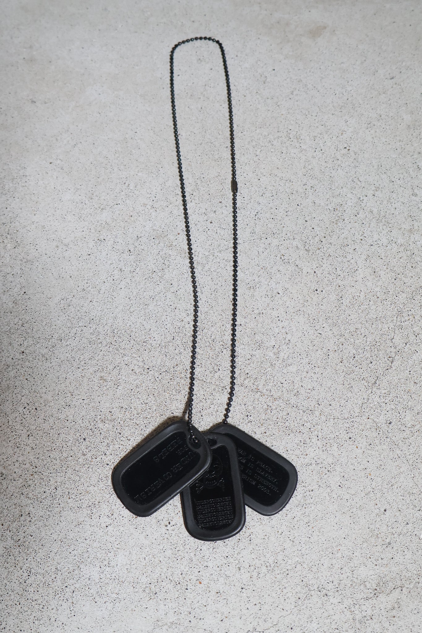 Undercover AW03 Paper Doll Dog Tag Necklace